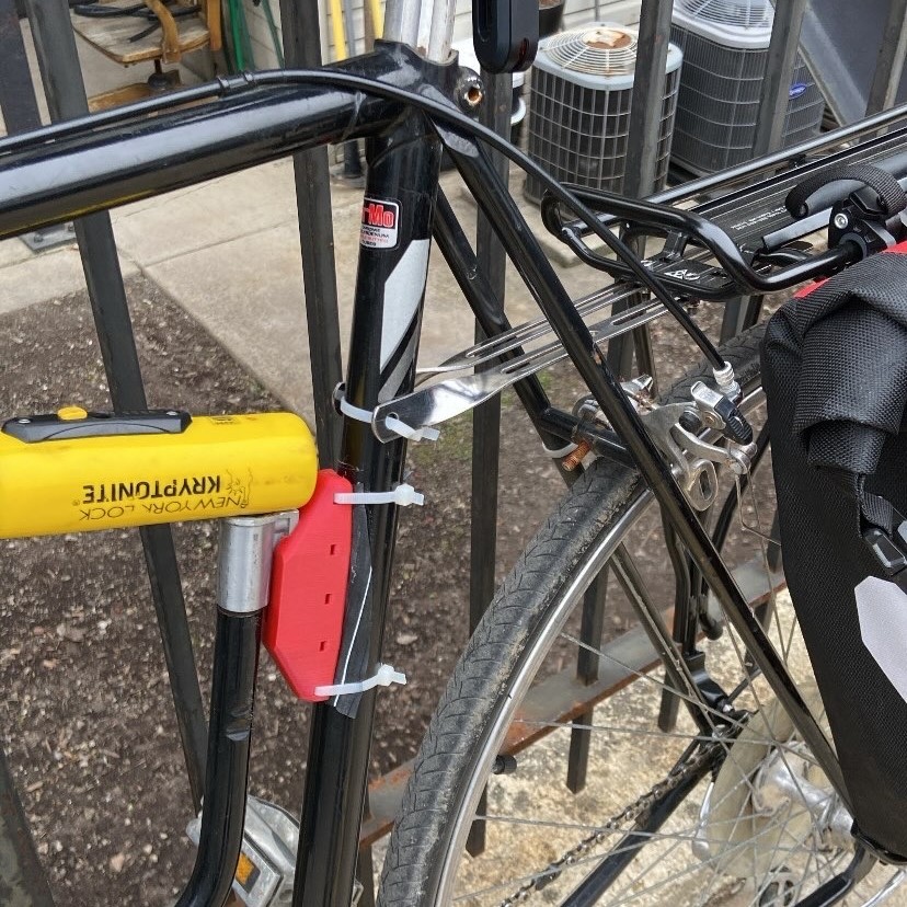 3D printed bike lock mount attached to bicycle